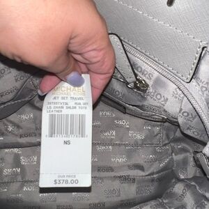 Michael Kors purse used once tag still on